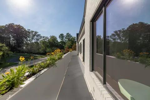 Driveway along the side of the house