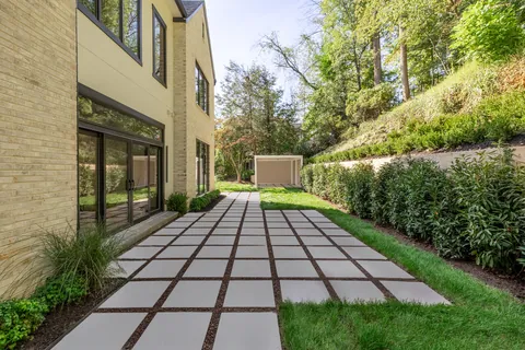 Rear lawn with paver walkway