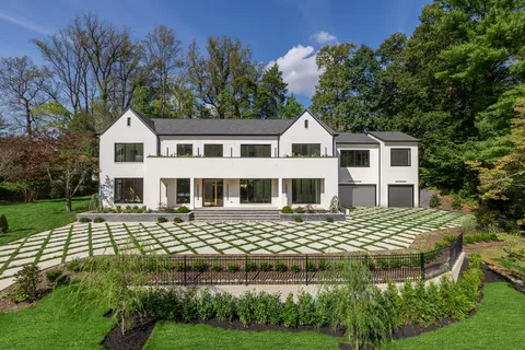 Front of the house with paver motor court