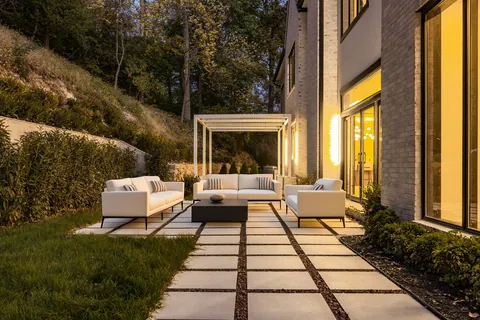 Rear patio and pergola at dusk