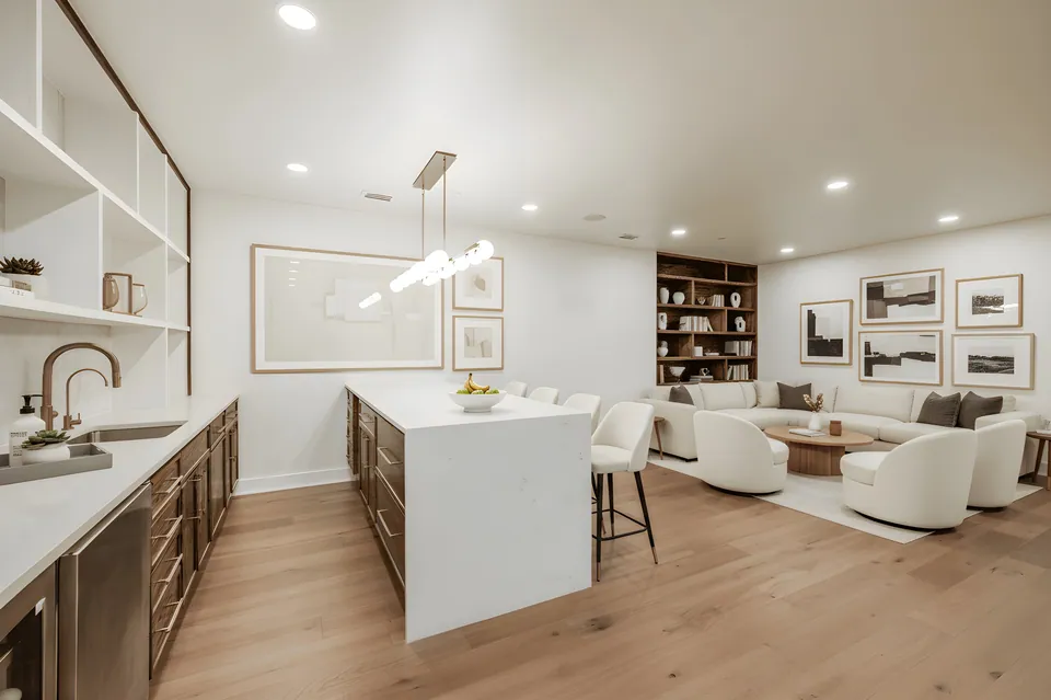 Lower-level recreation room with wet bar