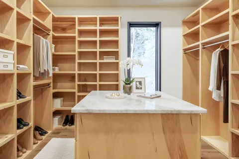 Primary walk-in closet with center island