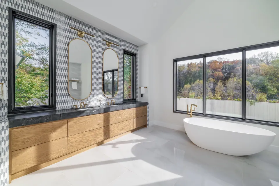 Primary bathroom with freestanding tub and double vanity